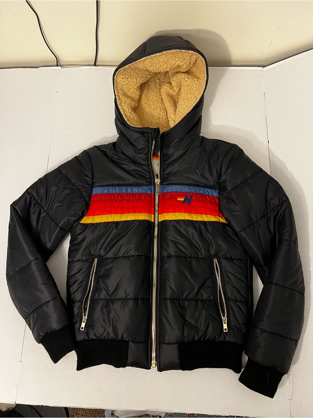 Aviator Nation Black Hooded Puffer with Blue, Red & Yellow Chest Stripes